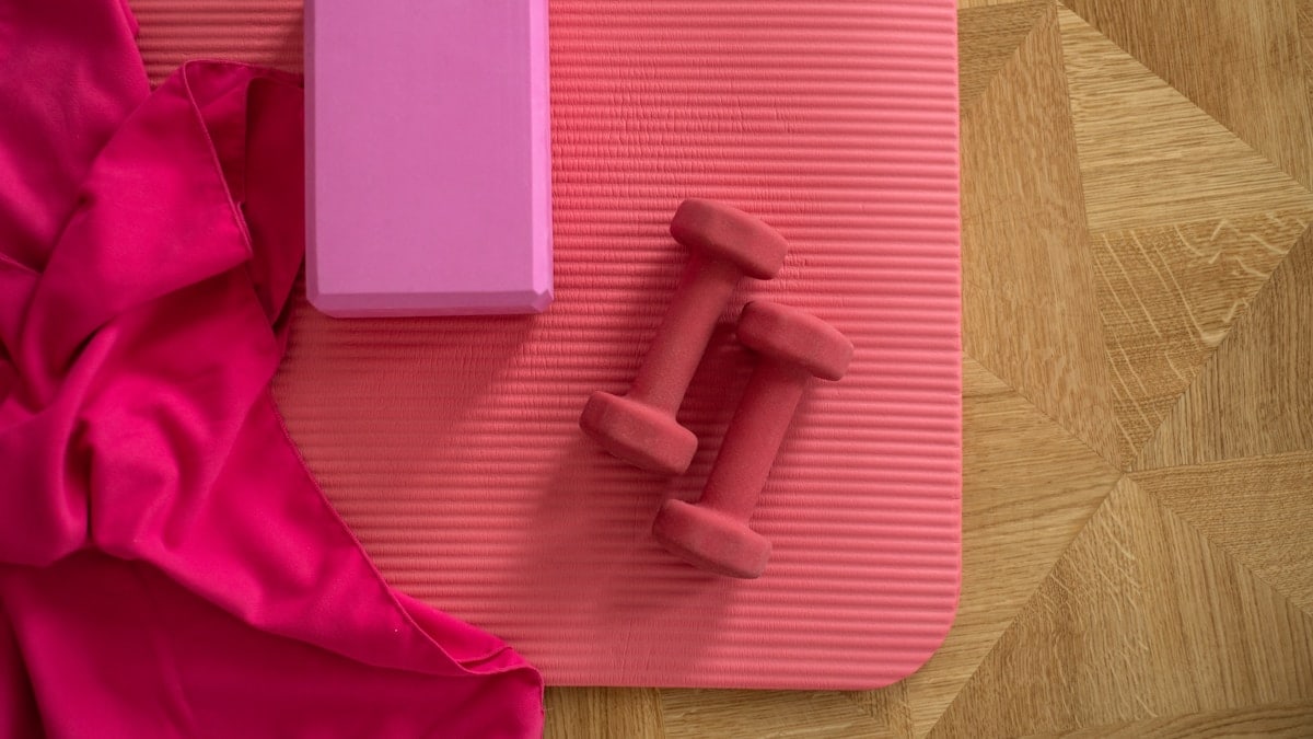pink exercise mat with weights